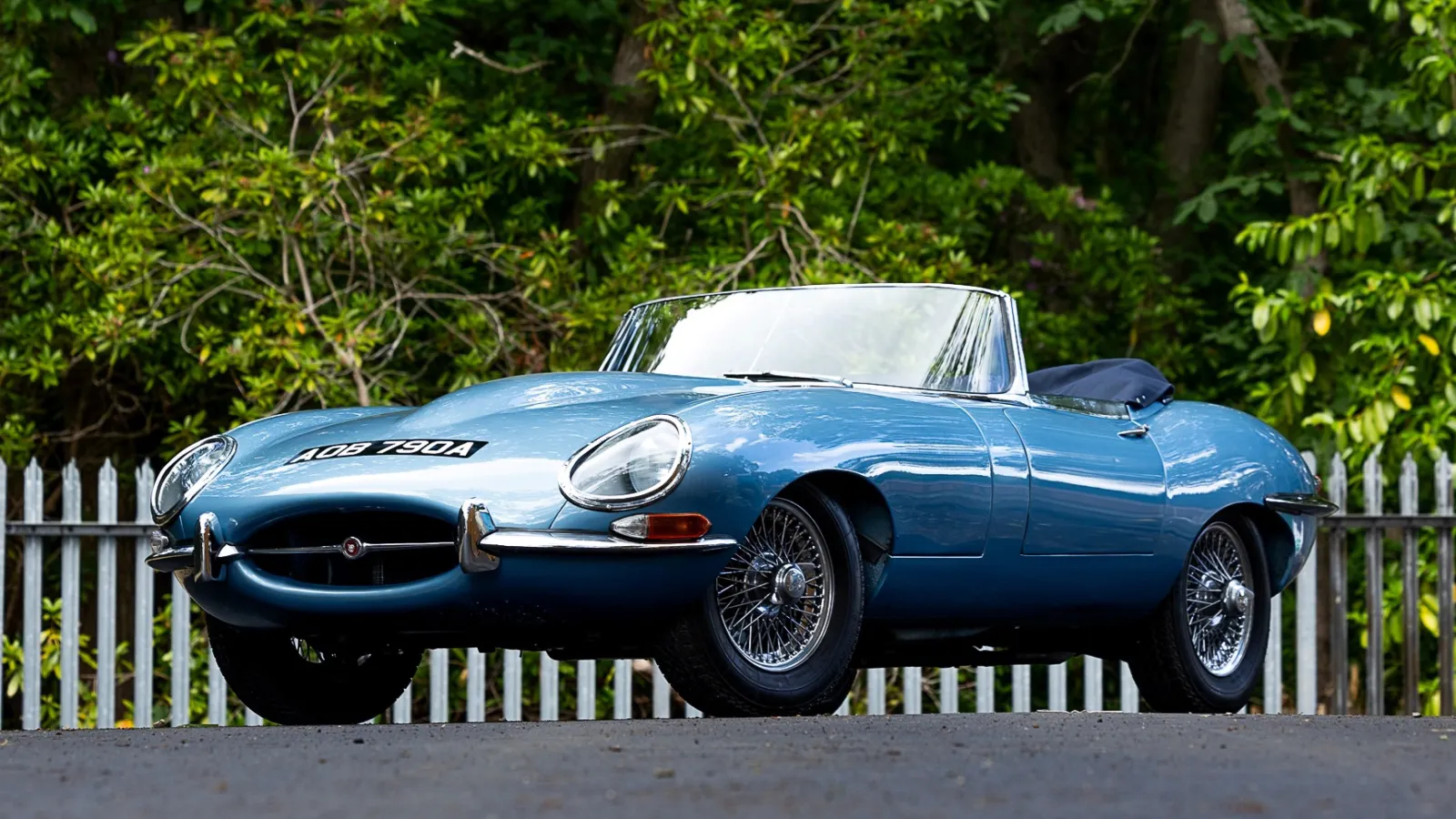 Front left side view of Blue Jaghuar E-type Convertible for self drive hire
